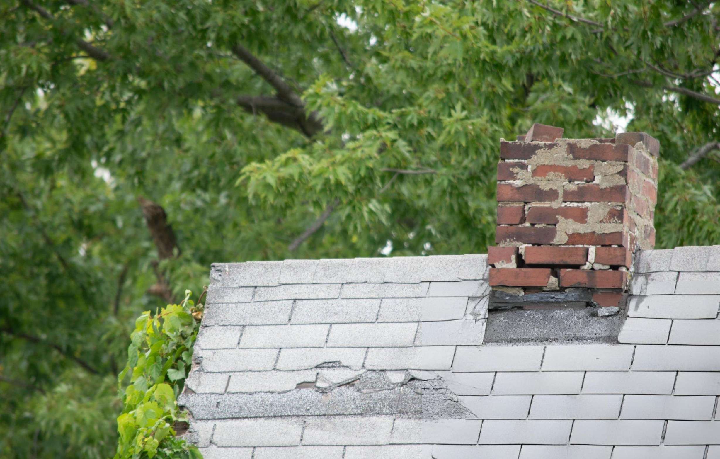 Damaged chimney on a roof