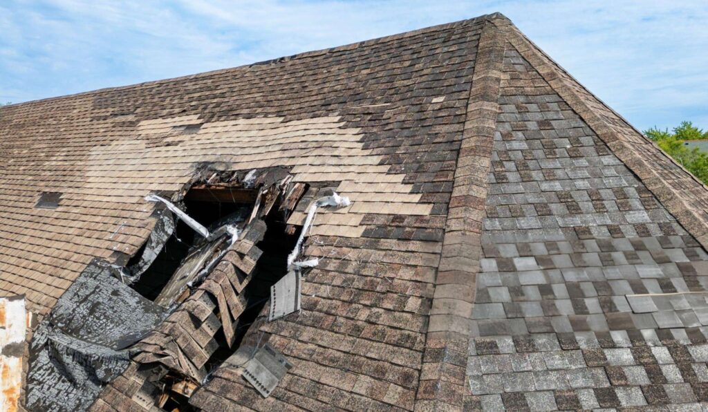 Emergency-Roofing-Repair-Toronto (2) Damaged roof with missing shingles