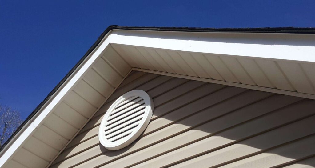 Roof vent against clear blue sky
