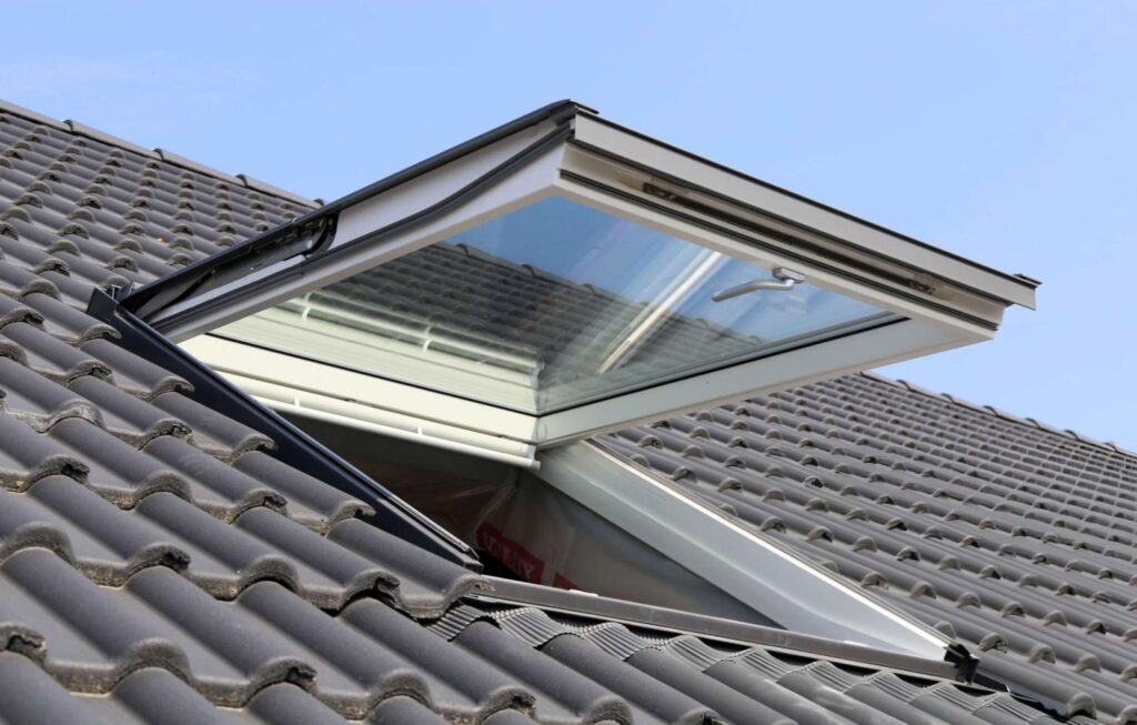 Open skylight on a tiled roof