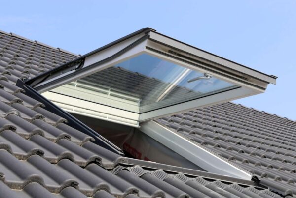 Open skylight on a tiled roof