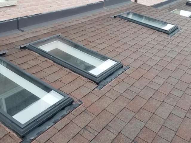 Roof with multiple skylights installed.