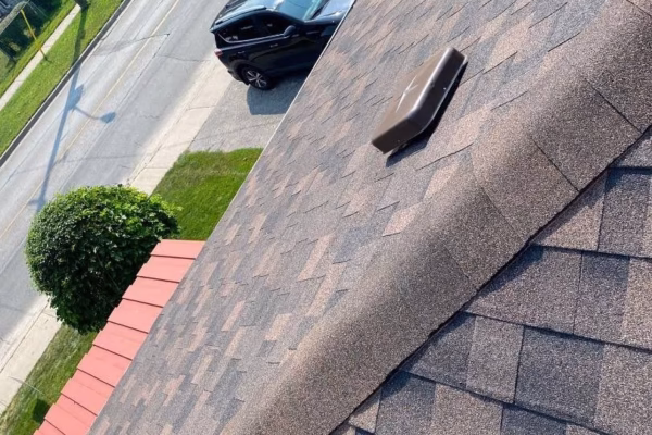 asphalt-shingle-roof-with-ridge-and-roof-vent