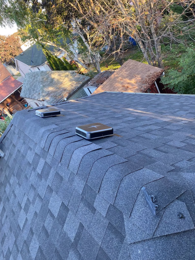 Complete shingle roof replacement with flashing and ventilation upgrades - 5