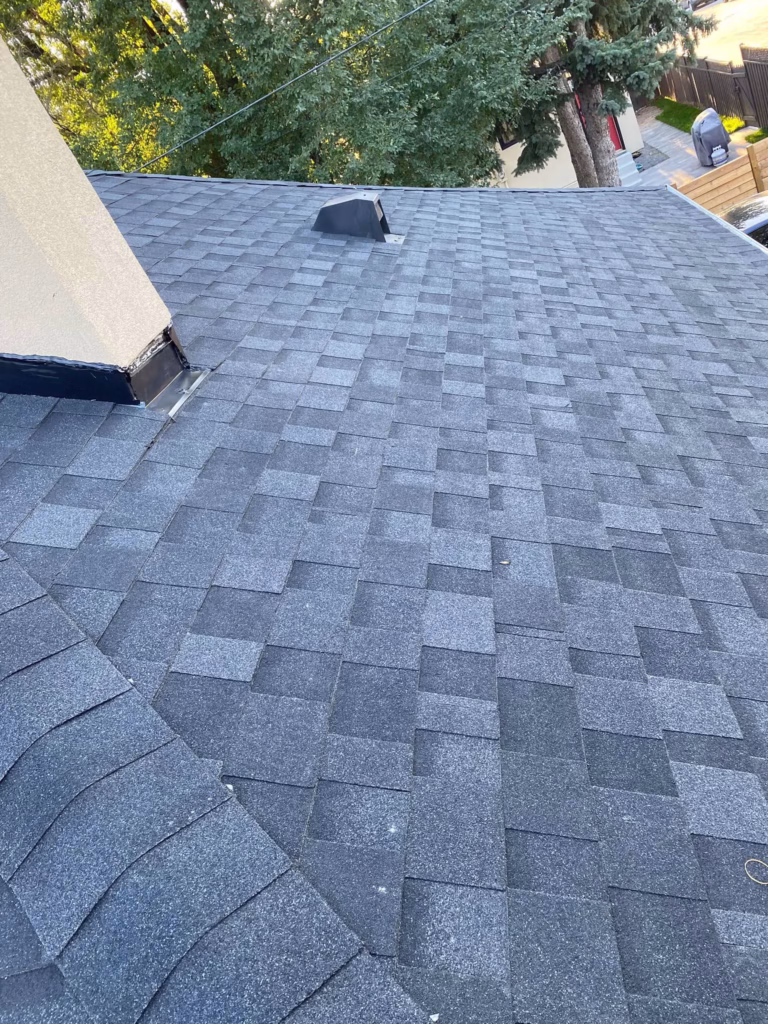 Complete shingle roof replacement with flashing and ventilation upgrades - 4